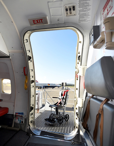 Wheelchair at plane exit image